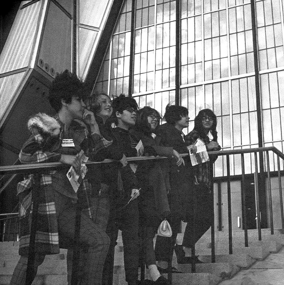 archival photo of students standing outside