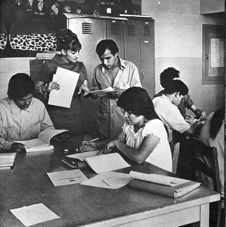 archival photo of students studying